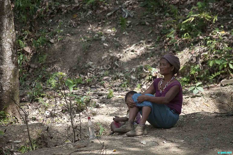 A lady relaxing at Eshing Thingbi Machi Hill, Chandel District