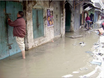 Slush and mud compounded by the unfinished sewerage project runs through Paona bazar