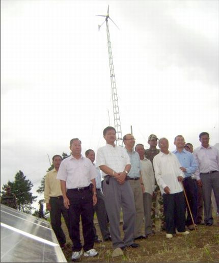 The wind-solar power panel being set and the official team from MANIREDA and others at Lamdan village