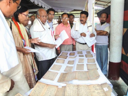 Art & Culture Minister Ph Parijat along with officials and Puya experts observing the ancient books (Puyas) of Manipur being put on exhibition on Oct 24 2010