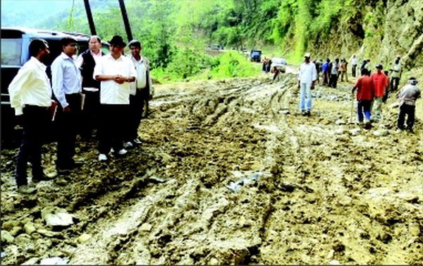 A Ministerial team assessing condition of NH-37 during the tour of the Imphal-Jiribam section