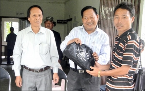 Sadar Hills ADC Chairman SH Seipu distributing MNREGS medical kits to villagers