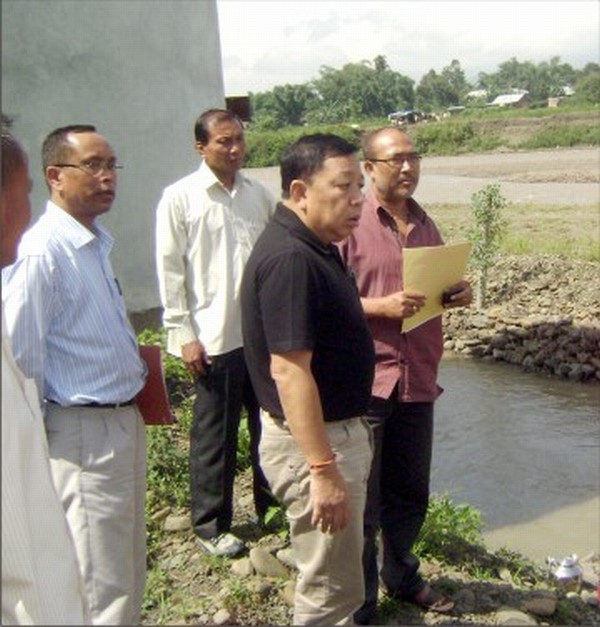 N Biren with IFCD officials inspecting the Sekmai river canal