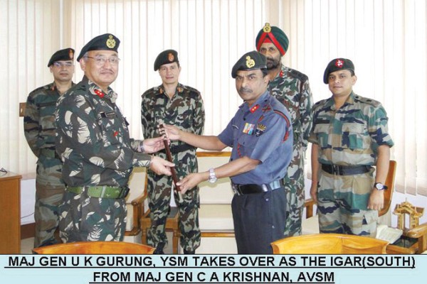 Major General, CA Krishnan handing over the baton to Maj Gen UK Gurung (L)