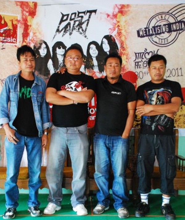 Members of  rock band, Post Mark posing for lensemen