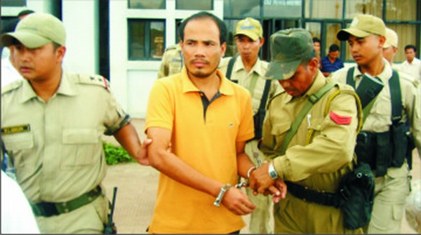 File picture of Sunil Meetei brought to Imphal Airport after arrest