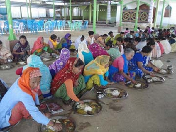 Womenfolk enjoying lavish meals at Ningol Chakkouba celebration organised by ACODOM at Moreh