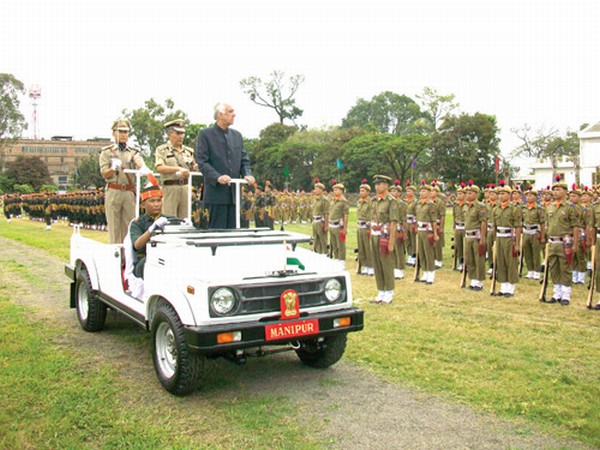 Governor Gurbachan Jagat reviewing guard of honour on the occasion of 119th Raising Day of Manipur Police