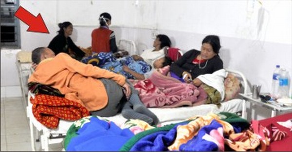 The arrow points to the netless bed allotted to a patient with suspected Dengue in CCpur