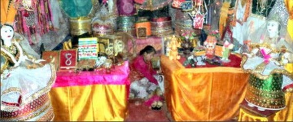 The stall displaying Potlois wrapped around dolls at the ongoing Sangai festival