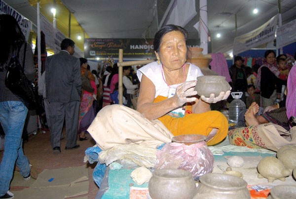 Sarungbam Barmomla engrossed in her pottery