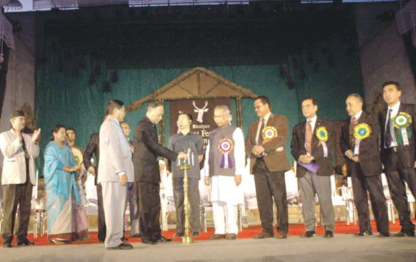 State CM, O Ibobi lighting the inaugural lamp of the Manipur Sangai Festival, 2011 (Manipur Tourism Festival)