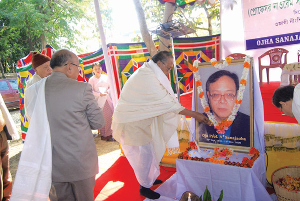 Floral tributes being offered to the photograph of Late Prof N Sanajaoba on his 2nd Death Anniversary