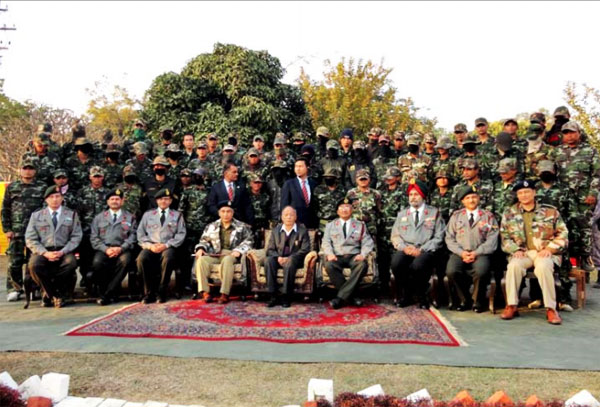 CM O Ibobi Singh, State and Assam Rifles officials with the surrendered UG cadres at IGAR (S)