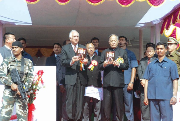 Guv, Gurbachan and CM Ibobi releasing a souvenir on the occassion of World AIDS Day