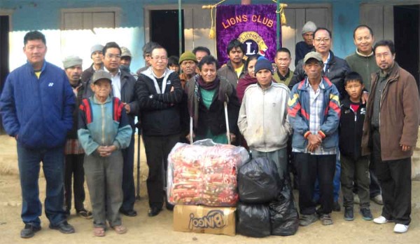 Members of Lions Club of Kohima visiting Leprosy people at Naga Bazaar, Kohima on December 11, 2011