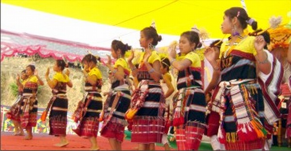 Young girls  perform a traditional dance to kick off the Gaan Ngai festival