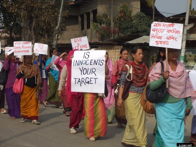 Womenfolk cutting across community line participating in a rally protesting crime against women and children at Imphal in January 2012