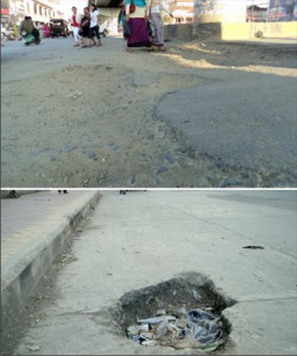 No maintenance : A crater and the road beneath the flyover