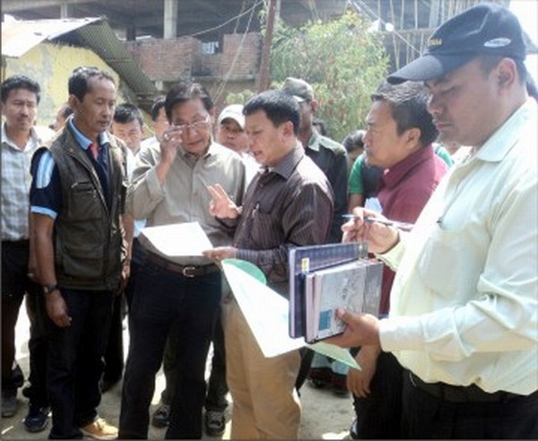 MLA Kh Joykisan and PWD officials talk during the inspection tour