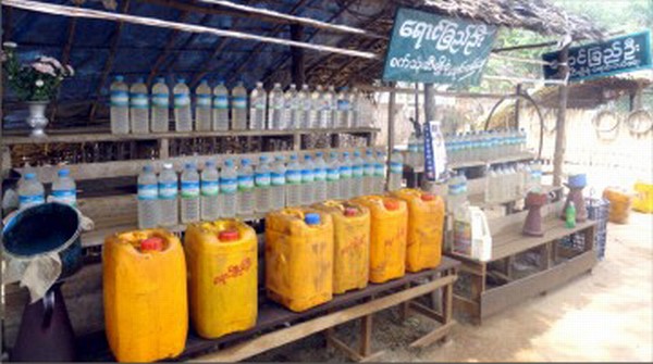 Fuel put up for sale on the roadi side of Myanmar
