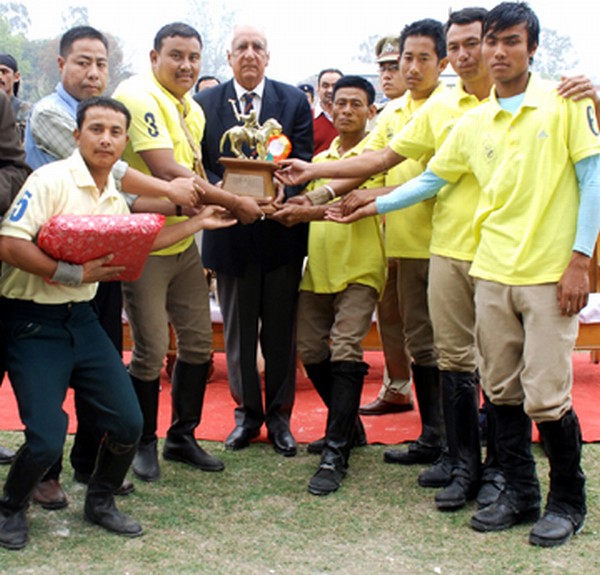 Governor Gurbachan Jagat giving away champions trophy to Singjamei Polo Club players