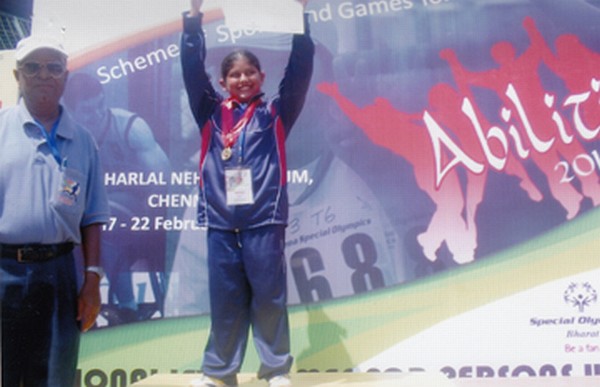 Special Games double gold medal winner Shruti Jain of Manipur acknowledges cheers at the prize distribution ceremony in Chennai