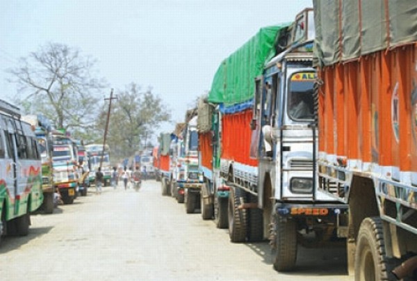 Rice laden trucks waiting to be unloaded at FCI godown