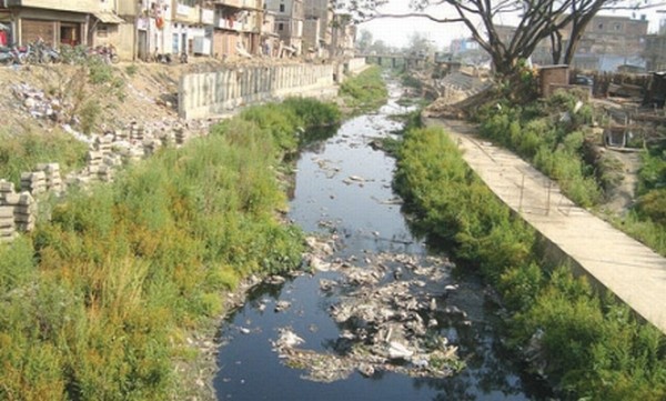 Natural flow of Nambul River in the heart of Imphal chock-a-block with garbages