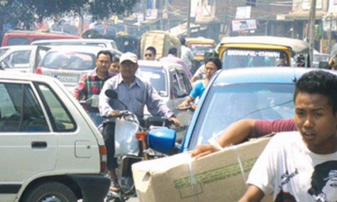 Caught in traffic snarl : In the absence of proper traffic management travelling on the roads of Imphal has become a hellish experience