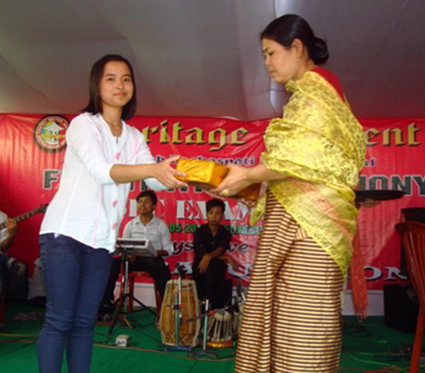 14th position holder of HSLC Exam 2012 Seema Yengkhom of Heritage Convent being felicitated 