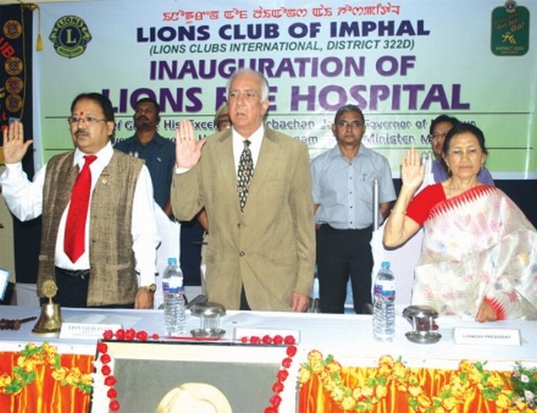 Governor Gurbachan Jagat and others taking oath at the occasion of inaugurating a newly constructed Lions Eye Hospital at Sangaiprou