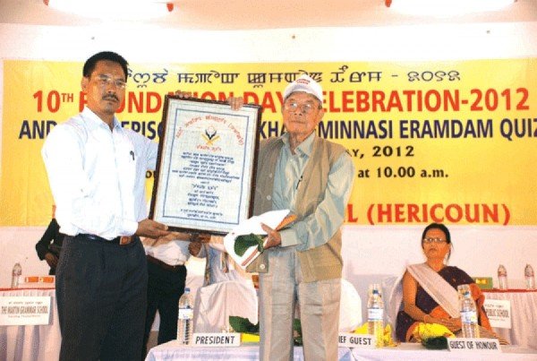 Musicologist Laishram Birendrakumar being was honoured with Tomthin Award on the occasion of 10th anniversary of HERICOUN