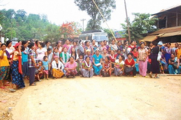 Womenfolk blocking the road at Moreh during the KSDC sponsored bandh over Kuki homeland demand on Tuesday