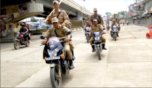Police commandos patrolling the road at Imphal