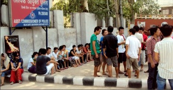 Students from the North East at the police station to lodge their complaint