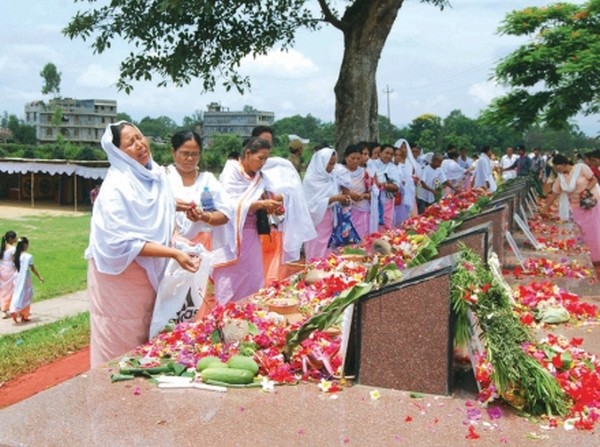 People offering floral tributes to martyrs of June 18 at Kekrupat Memorial Complex