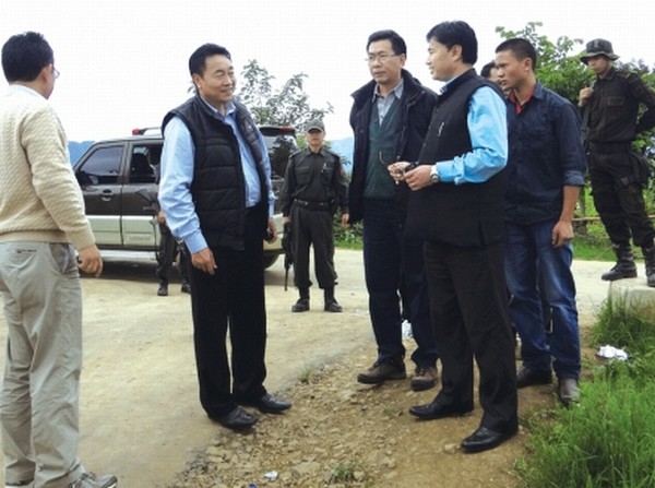 Minister Francis Ngajokpa sharing some light moments with MLAs Victor Keishing, MK Preshow and other DLOs during an inspection trip to Ukhrul dist