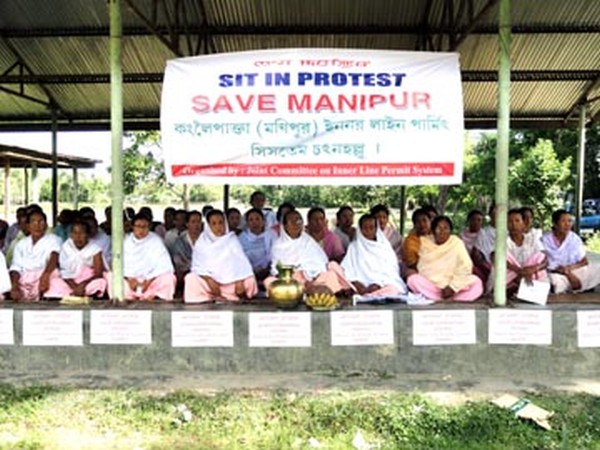 Womenfolk staging a protest demonstration at Bishnupur Keithel demanding enforcement of ILPS in Manipur