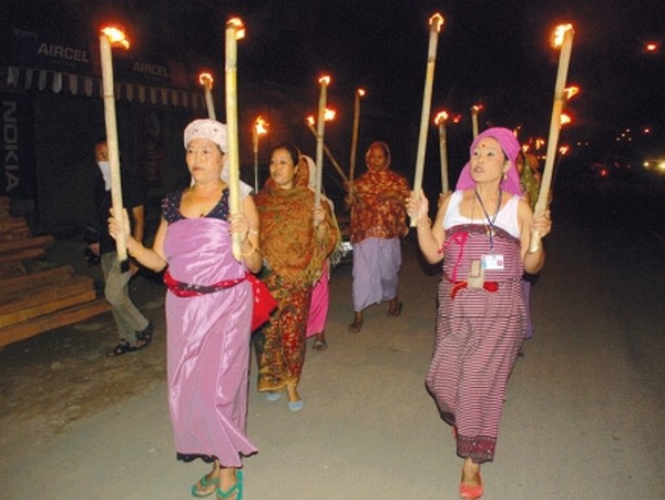 Womenfolk taking out a torch rally to press for ILP