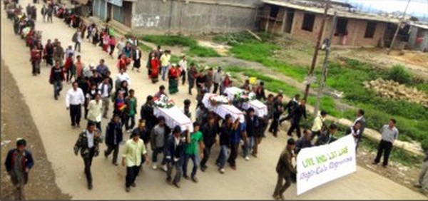 A rally staged in Ukhrul with the coffins of the killed villagers
