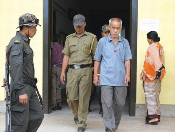 Kuber, who killed his wife, being brought out after the life sentence ordered by the court