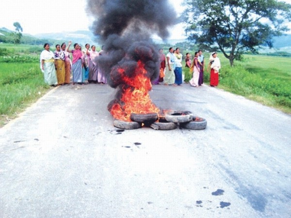 Womenfolk blocking road during the general strike called in connection with abduction of contractor Irungbam Irabanta
