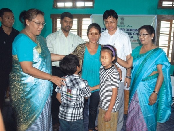Rescued children being handed over to their parents