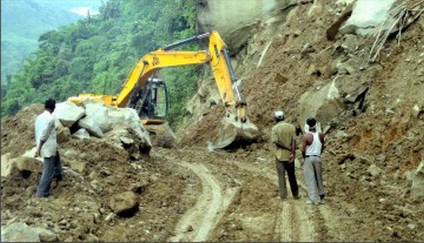 A landslide being cleared on NH-37