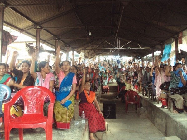 Villagers upholding the resolutions adopted during the public convention held at Noney Bazaar