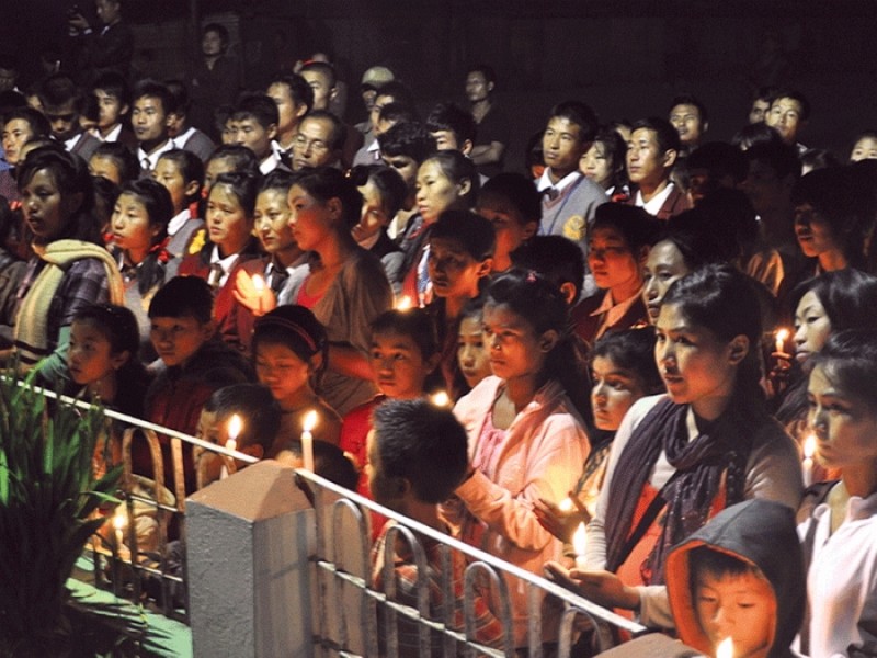 Ukhrul denizens participating in the candle light vigil to show solidarity to NE people