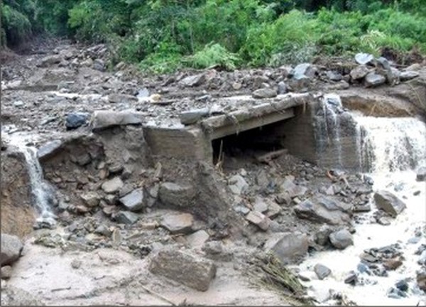Portion of the road which have been washed away by rain
