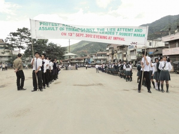 Students taking part in a rally at Senapati decrying the assault on T Robert Maram