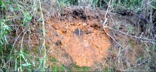 File pic of the crater left by the bomb blast at Kwatha Khunou